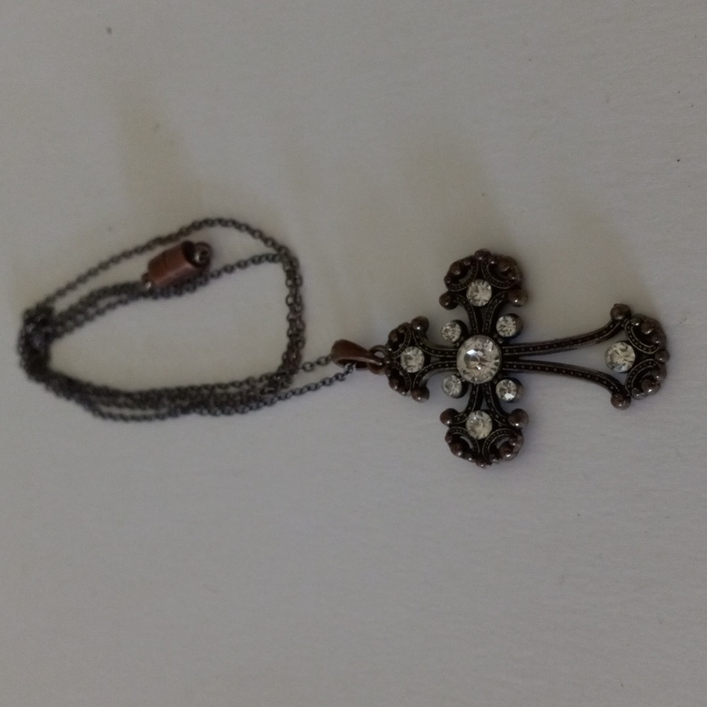 CROSS NECKLACE.  29in chain.  Copper tone finish.  Magnetic clasp.